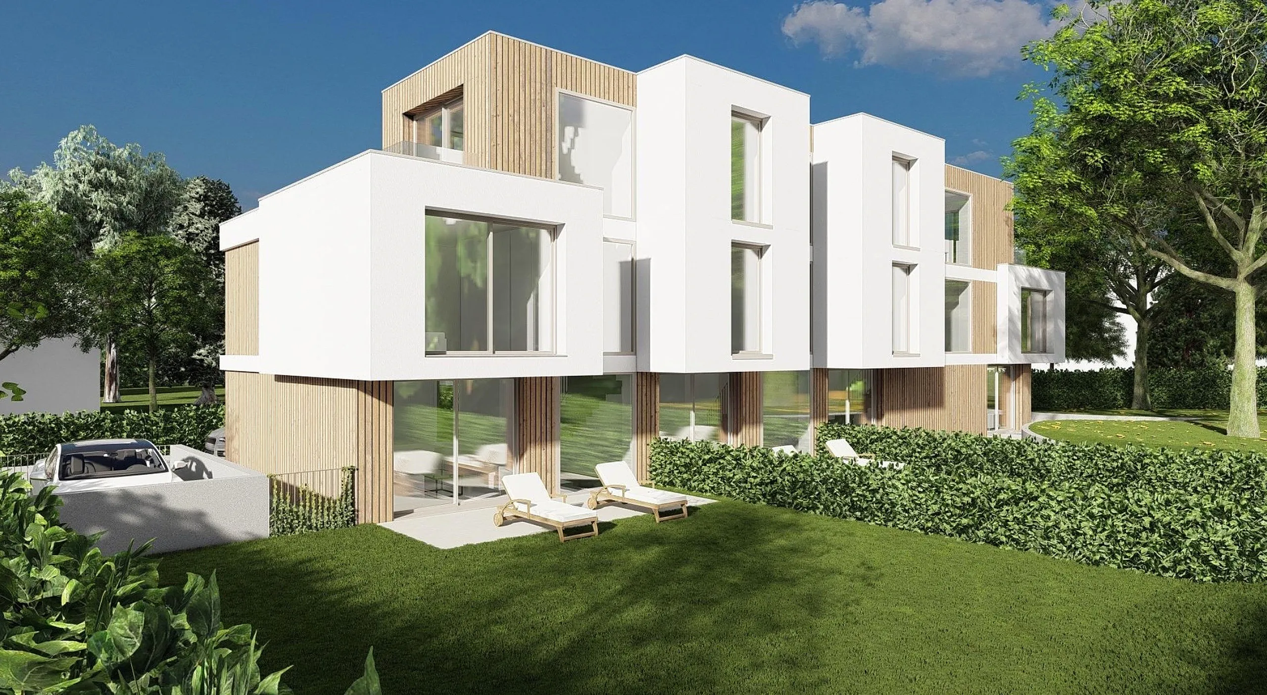 Reihenvillen des Projekts Floréa in Veyrier mit weissen Fassaden und Holzverkleidung, Blick vom Garten